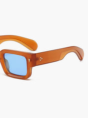 Sunglasses amber frame blue lenses top view