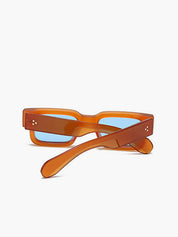 Sunglasses amber frame blue lenses side view