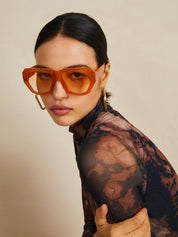 Sunglasses light brown geometric frame angled view
