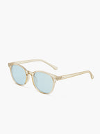 Sunglasses with transparent beige acetate frame and light blue lenses, front view