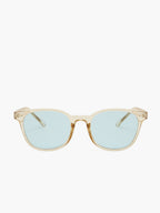Sunglasses with transparent beige acetate frame and light blue lenses, top-down view