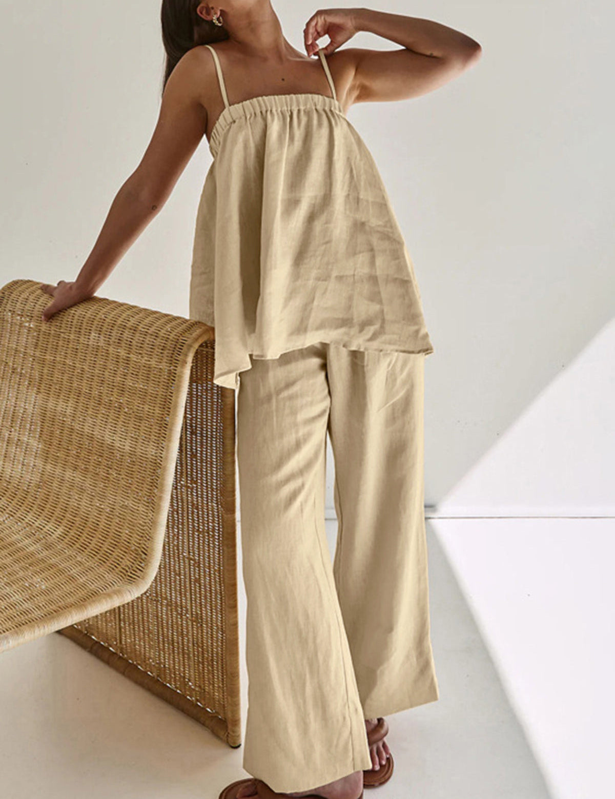Beige loungewear set with tiered top and wide-leg pants side view