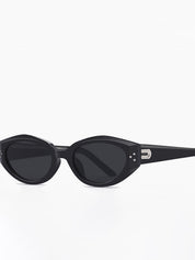 Black cat-eye sunglasses with silver hardware, angled front view