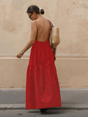 Red maxi dress with open back and thin straps, side view