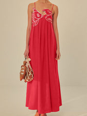 Red maxi dress with white fish embroidery front view