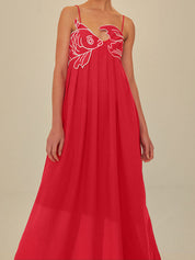Red maxi dress with white fish embroidery side profile