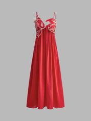 Red maxi dress with white fish embroidery front view on mannequin