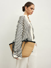 Striped satin blouse with wide sleeves angled side view