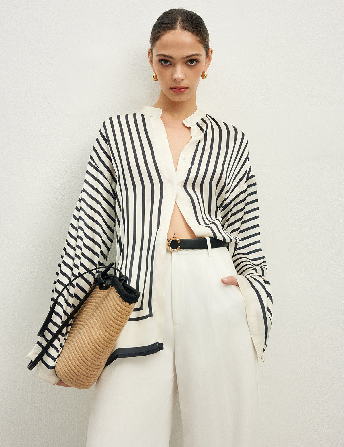 Striped satin blouse with wide sleeves front view