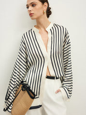 Striped satin blouse with wide sleeves close-up side
