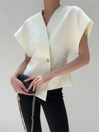 White V-neck top with gold button detail, front view