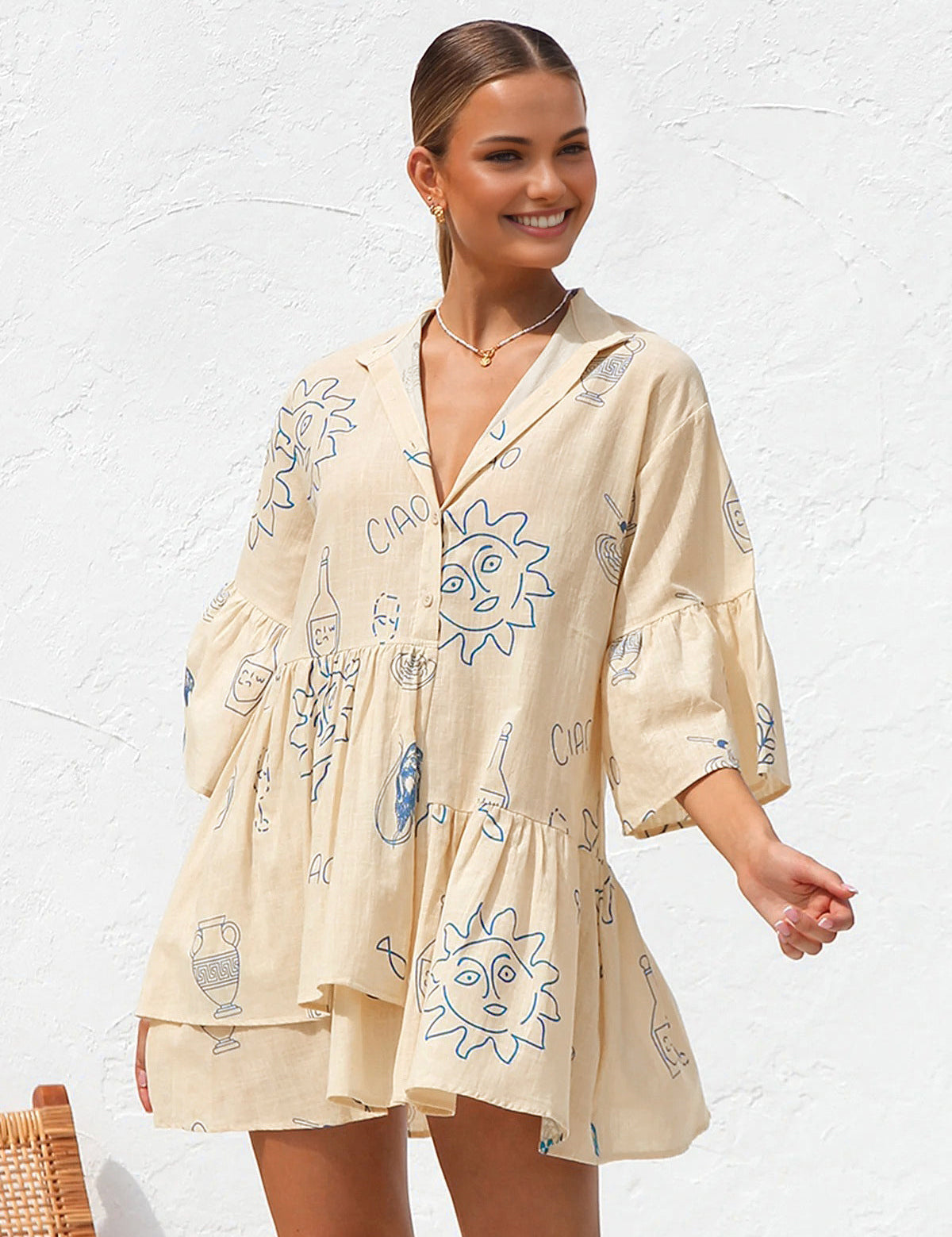 Summer dress with blue sun and bottle print front view