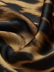 Leopard print fabric detail with smooth texture close-up