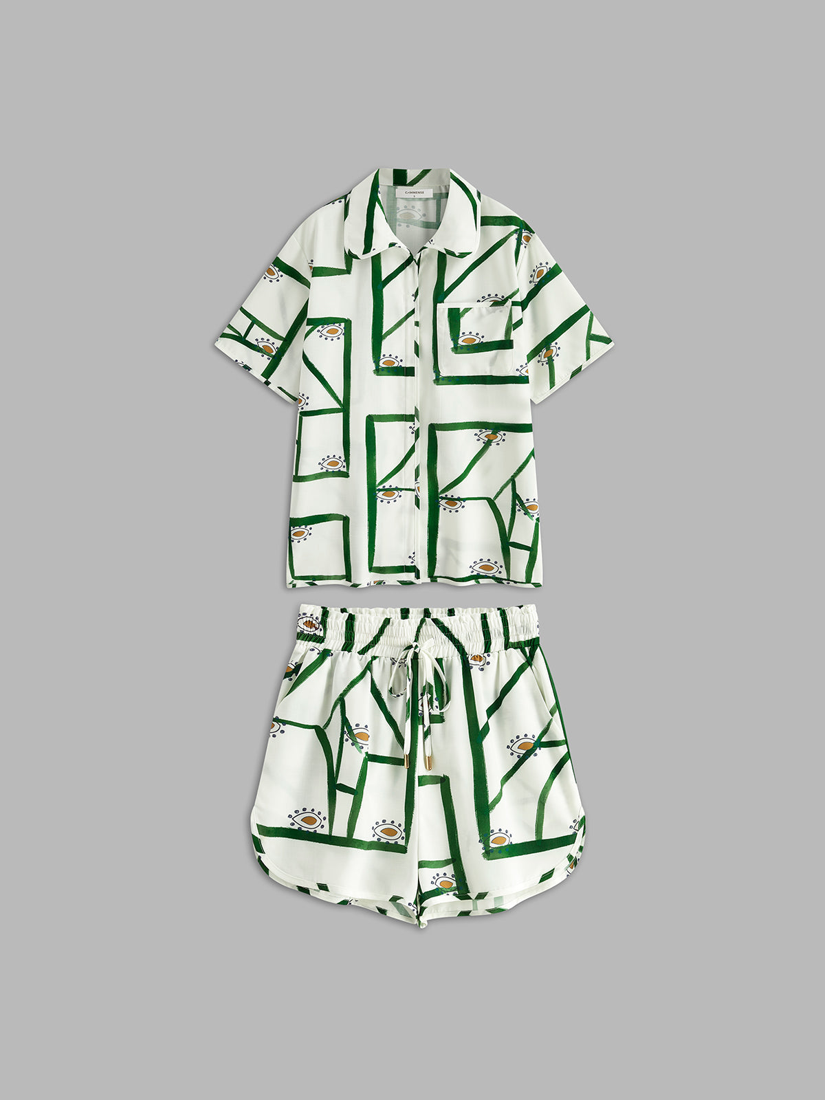 Loungewear set white with green pattern flat lay