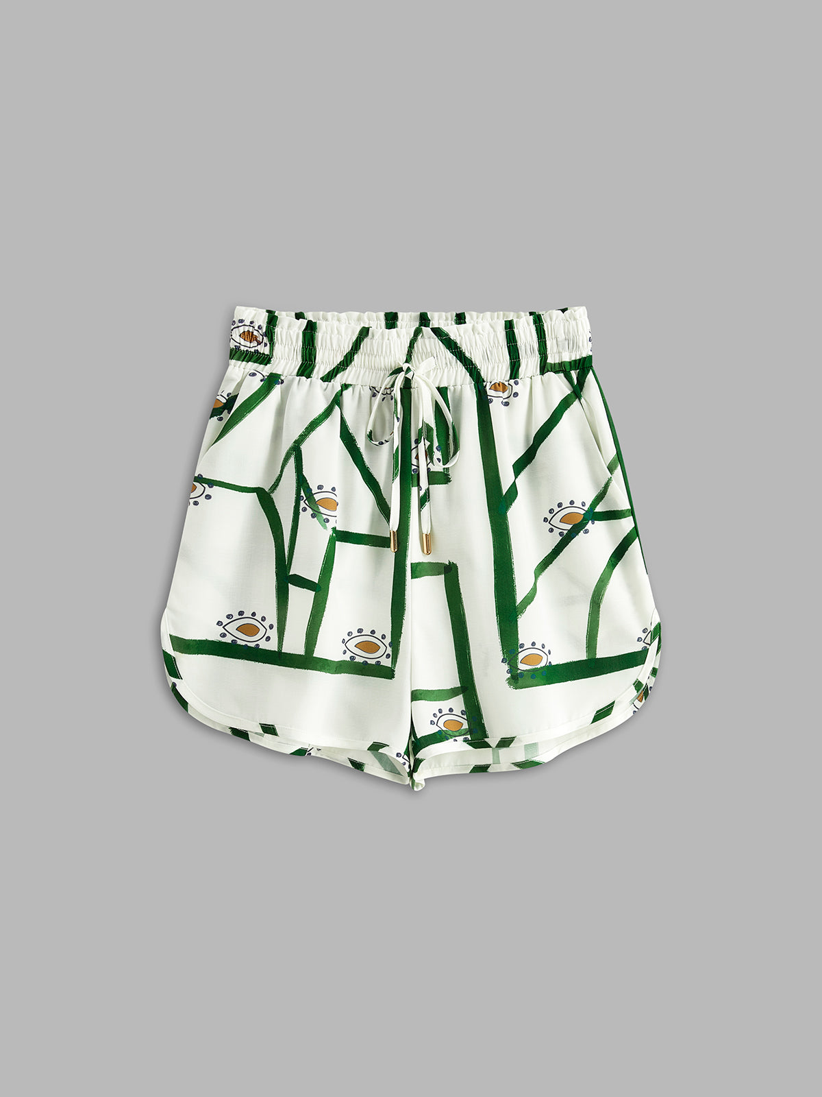 Loungewear shorts white with green pattern flat lay