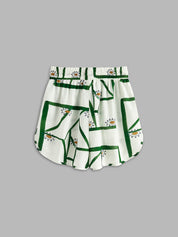 Loungewear shorts white with green pattern flat lay