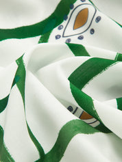 Loungewear shirt white with green pattern close-up detail