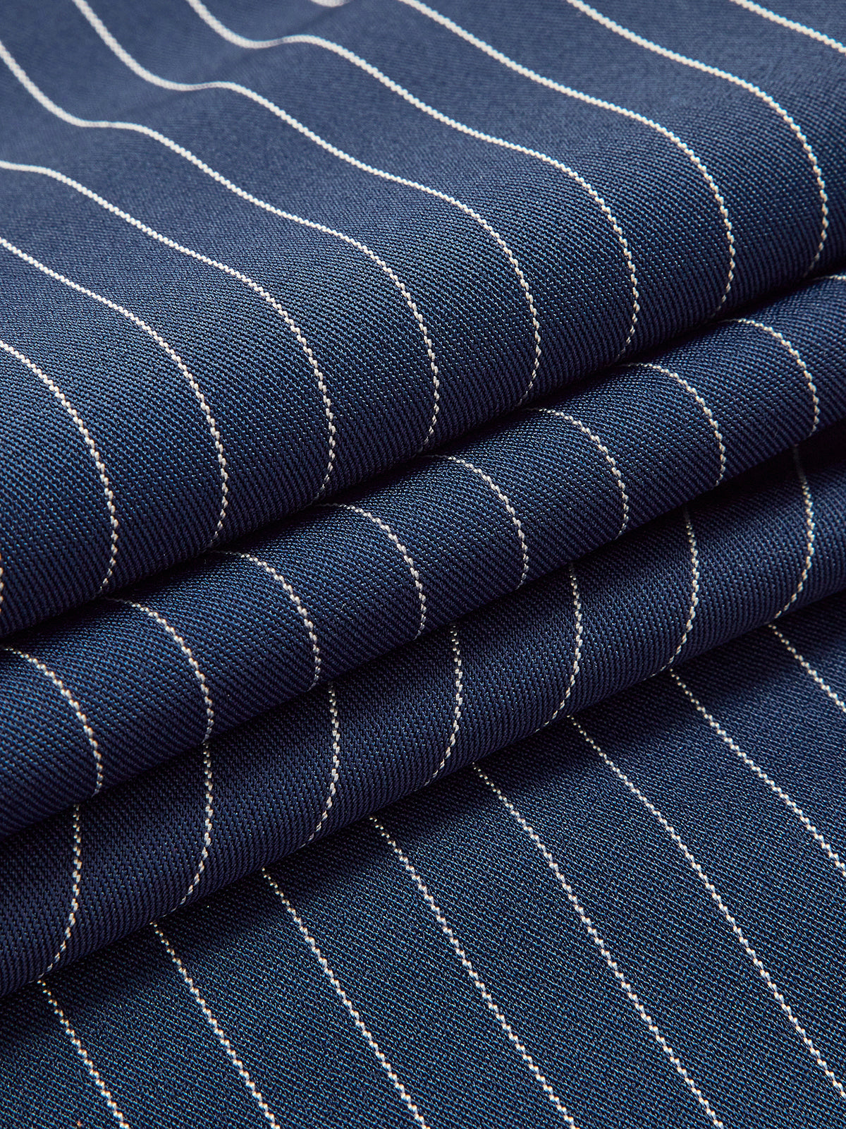 Navy pinstripe fabric detail close-up