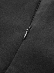 Mini-jurk zwarte stof met zwarte ritsdetail close-up