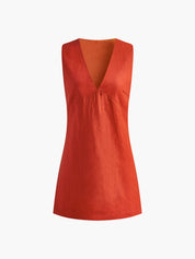 Orange linen dress with deep V-neck front detail