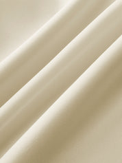 Pleated skirt fabric folds, white close-up