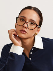 Glasses with tortoiseshell pattern worn by model, front view