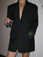Dames blazer zwart met groene print detail shot