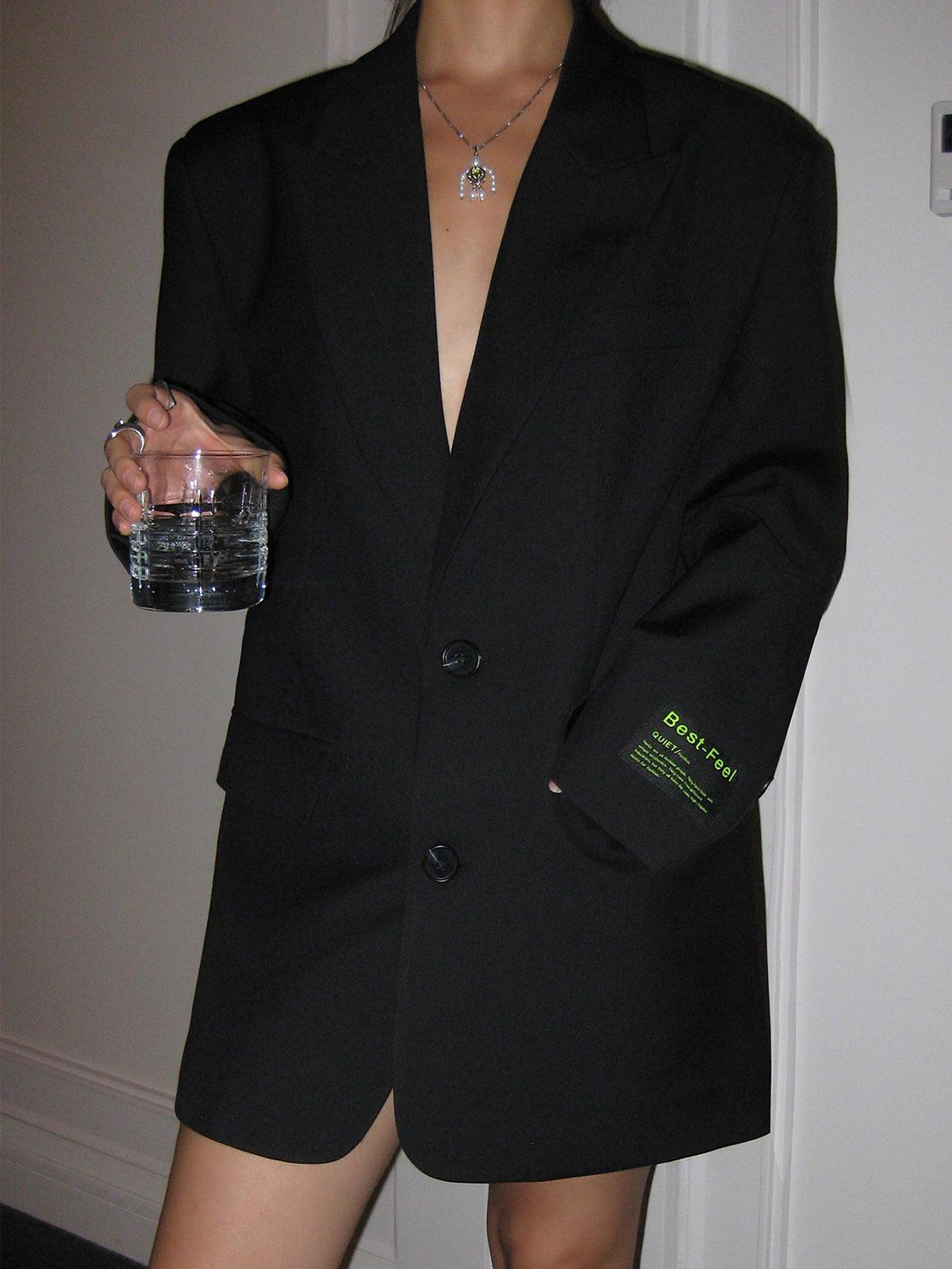 Dames blazer zwart met groene print detail shot