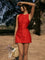 Red sleeveless dress with buttons front view
