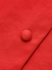 Red dress button close-up detail