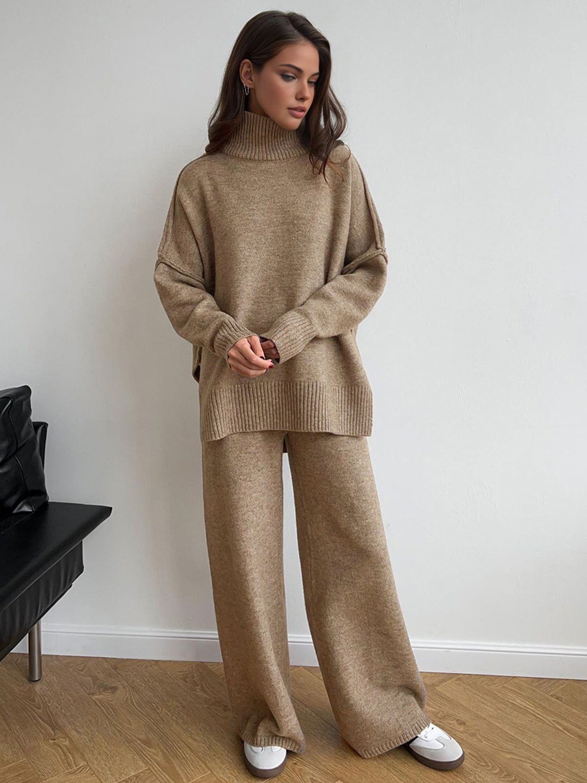 Beige knit sweater and pants set front view with hands in pockets