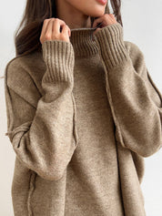 Beige knit sweater close-up of turtleneck and texture