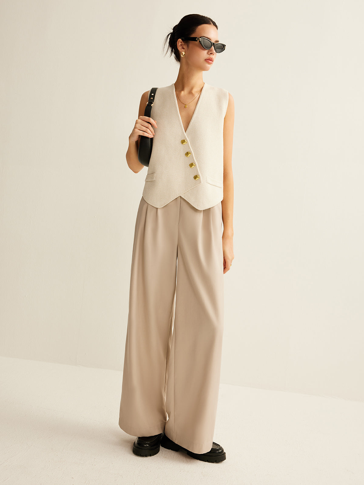 Cream vest with gold buttons full body view