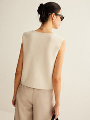 Cream vest with gold buttons back view