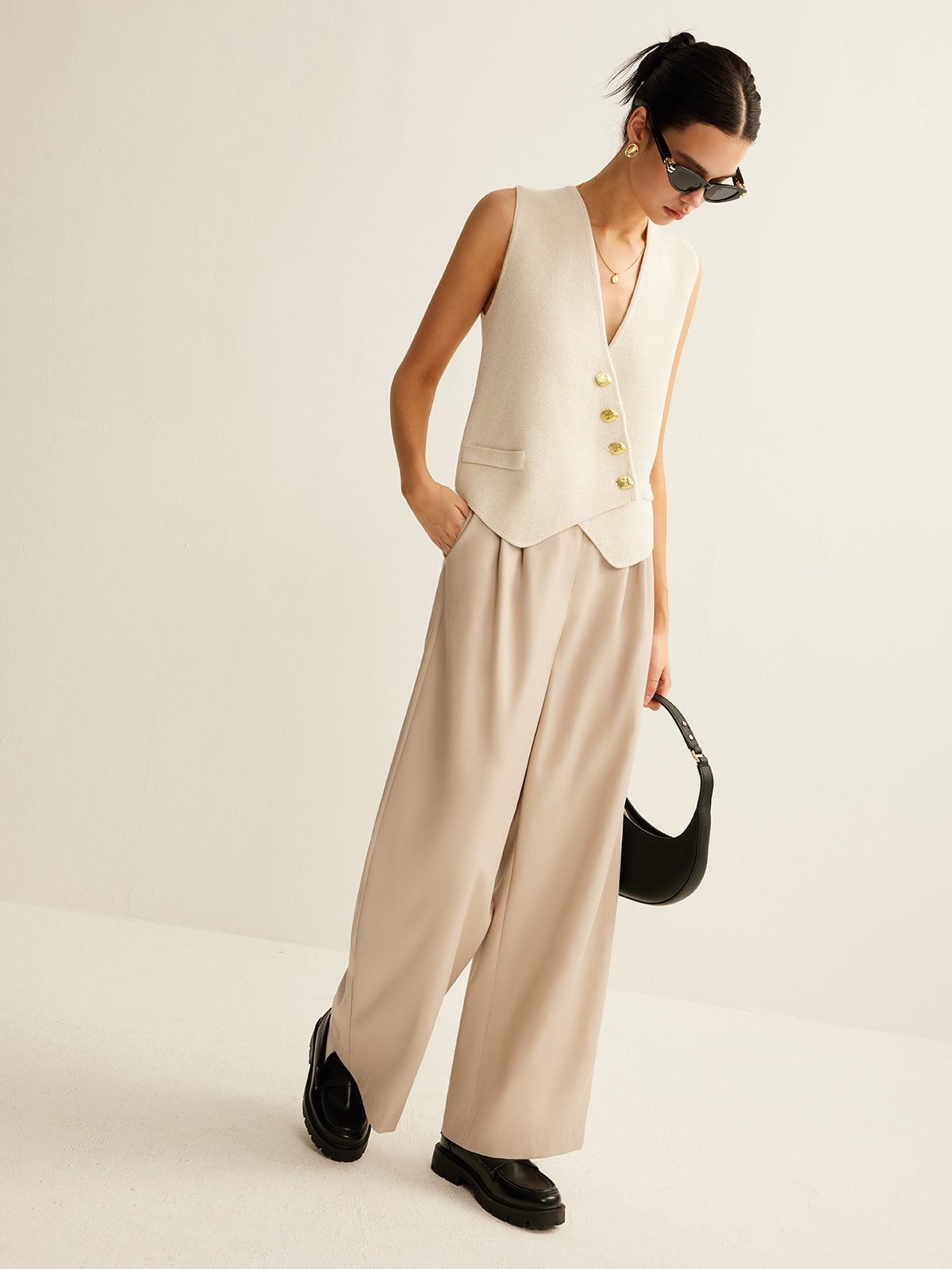 Cream vest with gold buttons full body pose