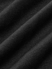 Close-up of black asymmetrical neckline bodysuit fabric texture