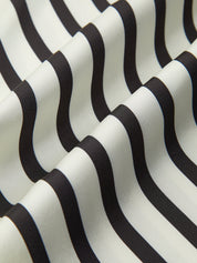 Striped satin blouse with wide sleeves fabric texture close-up