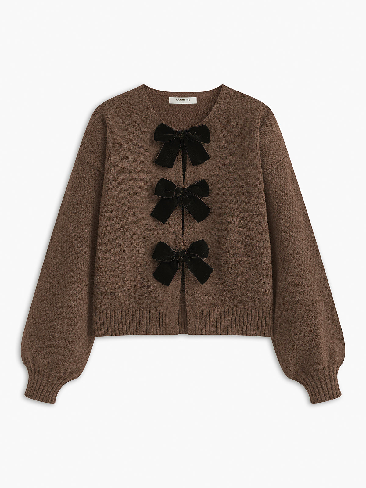 Cardigan brown with black velvet bows front view plain background