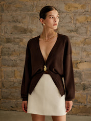 Brown cardigan with gold button front view