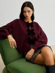 Cardigan burgundy with black velvet bows front view