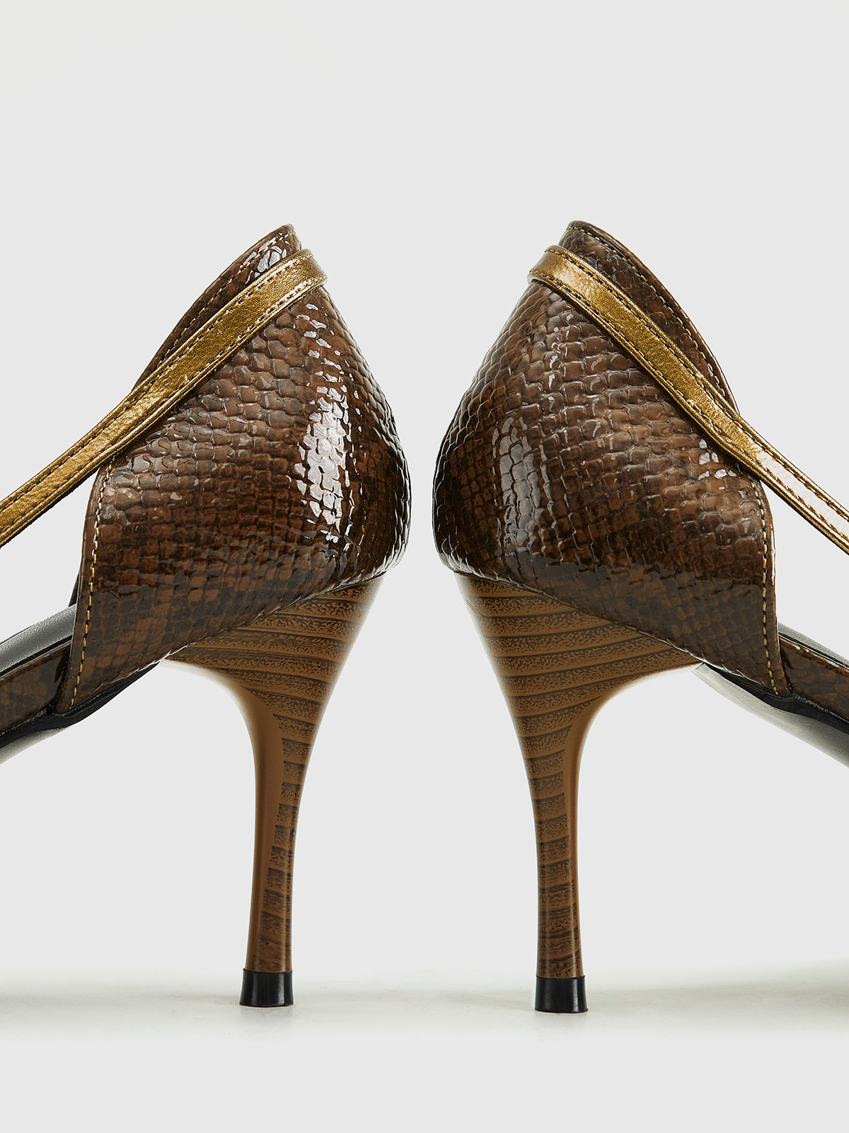 Brown snake print pumps heel detail