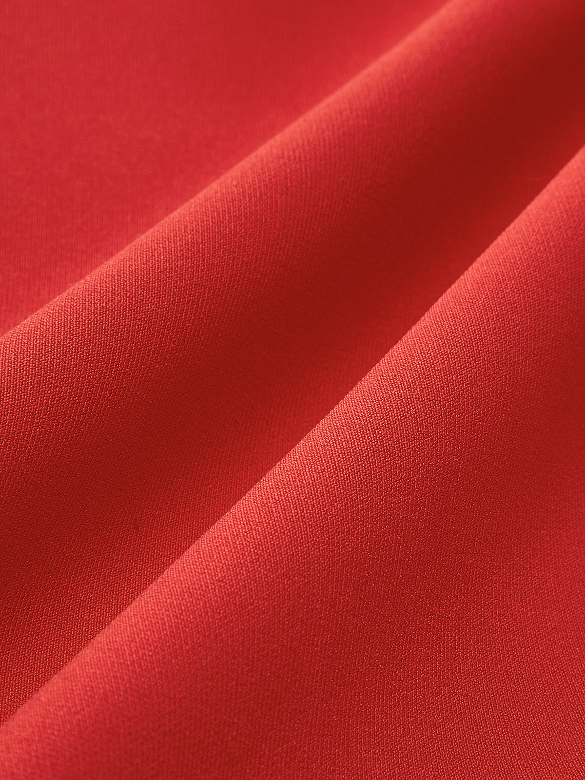 Red high-neck dress fabric texture close-up
