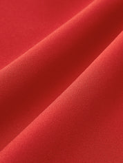 Red high-neck dress fabric texture close-up