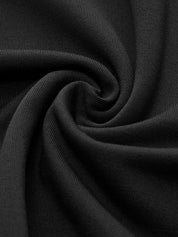 Close-up of black maxi dress fabric with high collar and thigh-high slit