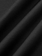 Detail of black maxi dress fabric texture with high collar and thigh-high slit