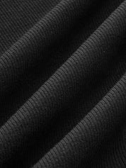 Black tank top with asymmetrical neckline fabric texture close-up