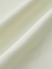 Close-up of white swimsuit fabric texture