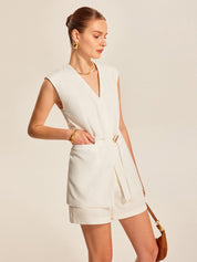 White sleeveless vest with belt close-up detail