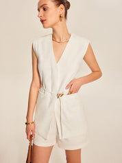White sleeveless vest with belt front detail