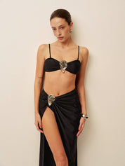 Black silk maxi dress with gold embellishments front pose